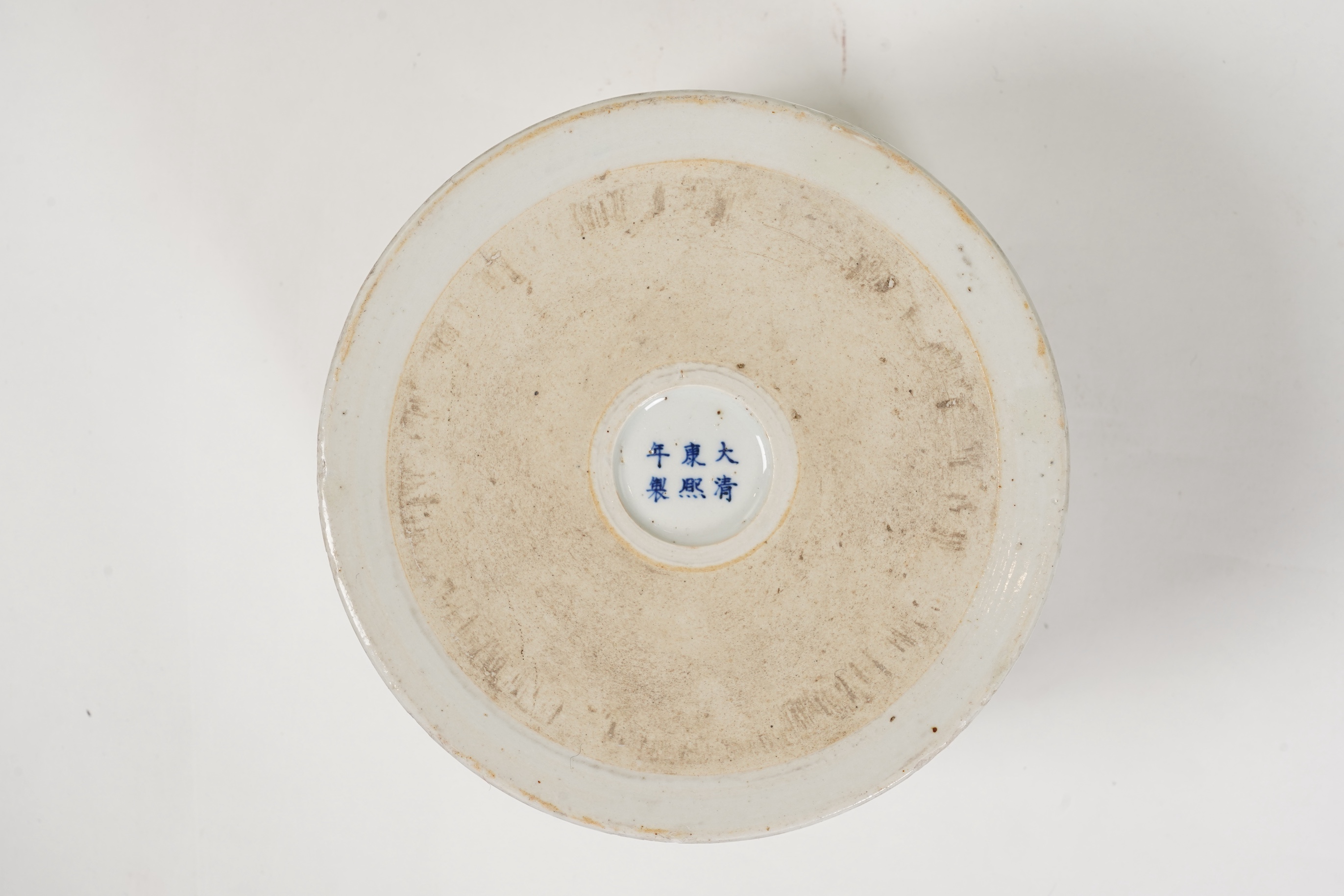 A Chinese underglaze blue and copper red inscribed brush pot, possibly Kangxi period